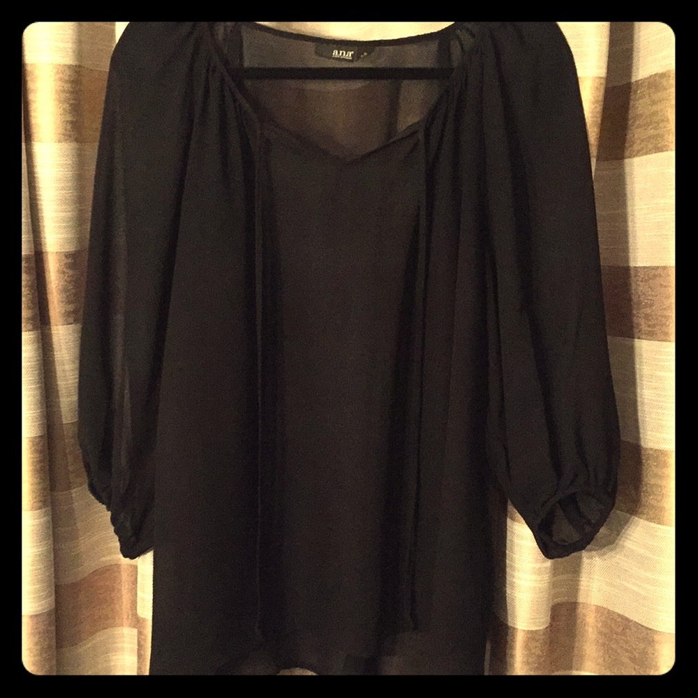 Sheer black blouse